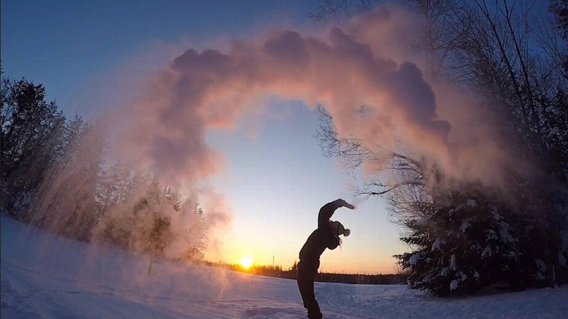 people-are-tossing-boiling-water-into-freezing-air-to-make-snow-video